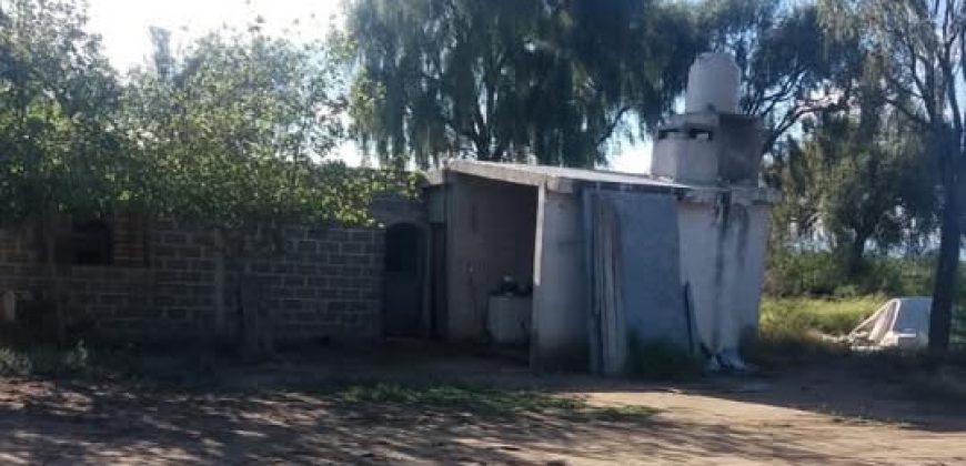 Terreno, casa y tinglado en Paso Viejo